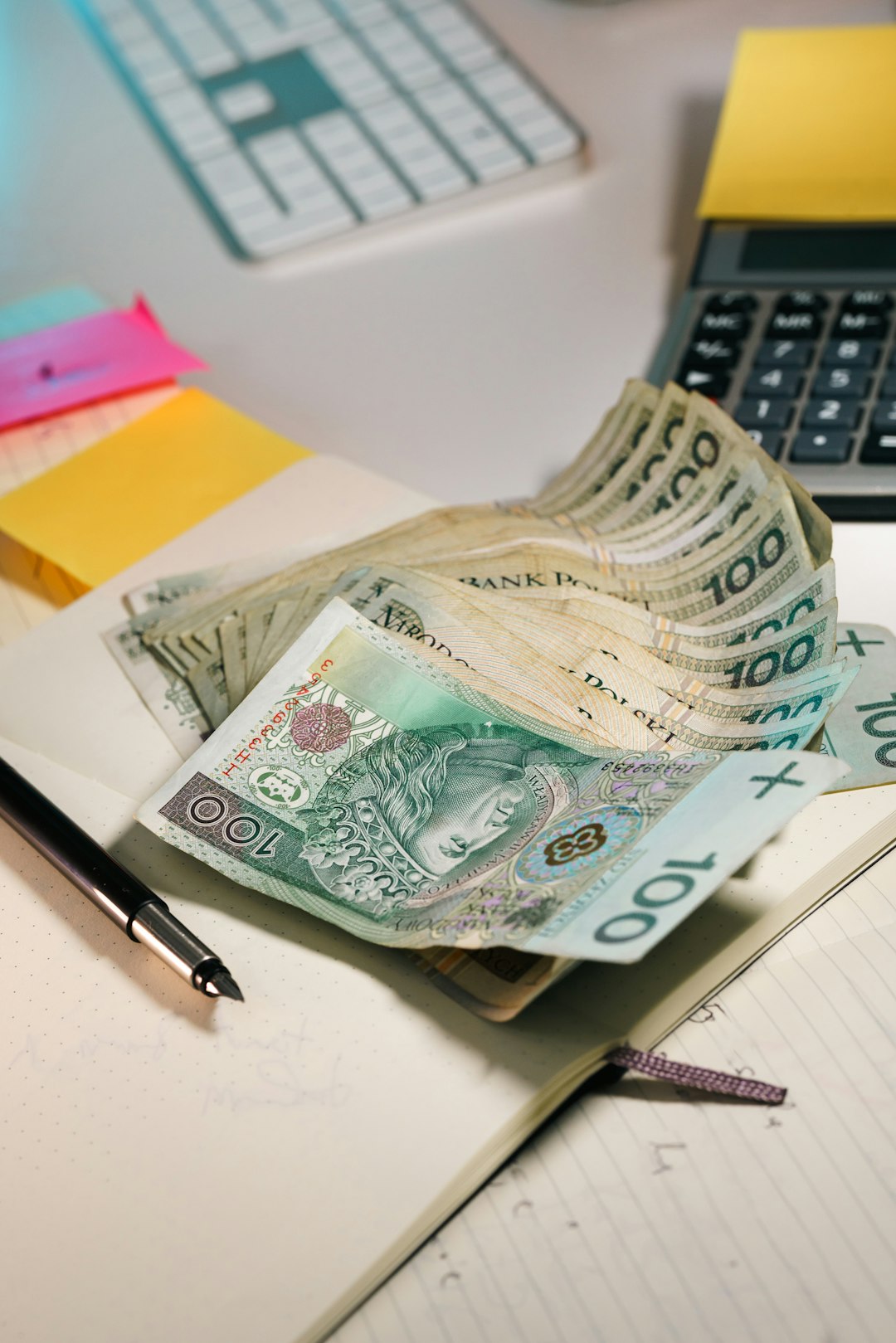 Polish currency budget contract signing expenses bills concept. Financial planning cost management agreement paperwork documentation accounting finance business economy